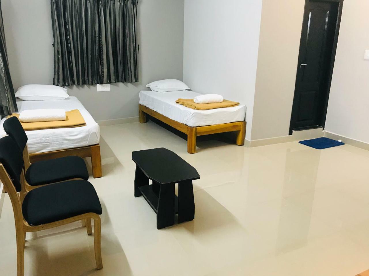 Отель Sharada Residency Somvarpet Экстерьер фото